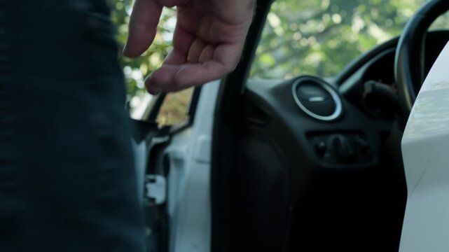 Man opening car door, entering vehicle, closing door and then getting out, driver entering and exiting modern automobile, close up on hand operating side door handle, automotive transport concept