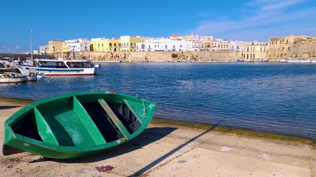 Gallipoli Puglia Italy Old Port Wooden Fishing Boats Castle View. Seagulls Natural Wave Audio, Left to Right Pan Salento Coast Traditional Fishermen Harbor B Roll 4K UHD Video
