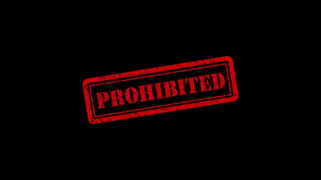 Red prohibited rubber stamp effect on black background, warning sign and restricted access concept