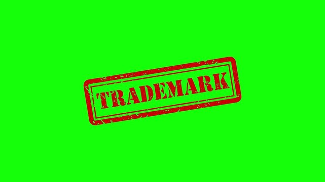 Red trademark rubber stamp animation on green screen, intellectual property and copyright protection concept