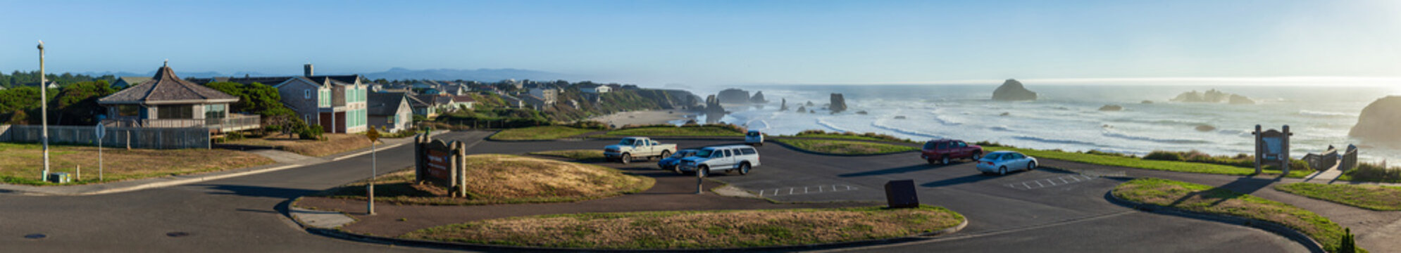 Coastal viewpoint parking lot overlooking an ocean beach wide panoramic landscape Bandon Oregon USA