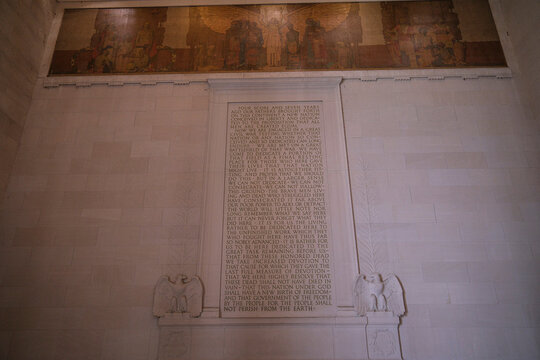 Gettysburg Address engraved on a wall of the Lincoln Memorial below its mural in Washington, District of Columbia, United States