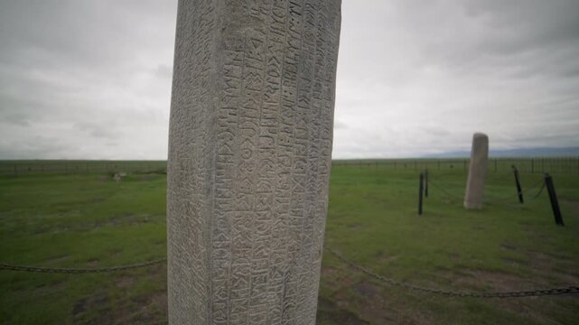 Historic runic inscription on a stone monument preserves ancient steppe writing heritage, Tonyukuk.