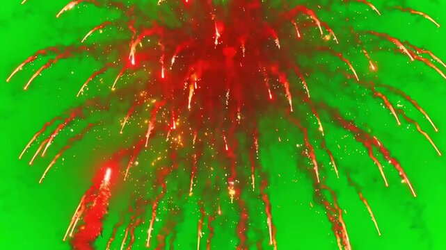 Exploding bright red fireworks display lighting up chroma key green screen background for video editing projects