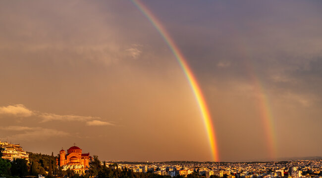 Double Rainbow Over Saint Paul Church and Thessaloniki Cityscape Following a Rainstorm