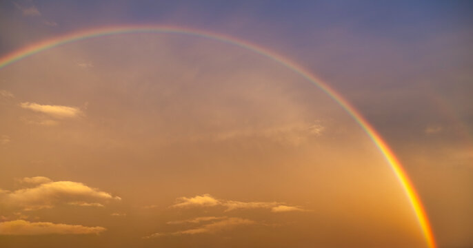 Full Rainbow Across the Sky Above Thessaloniki During a Dramatic Sunset
