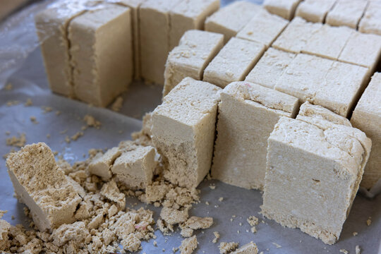 Traditional Greek Halva Blocks Displayed at a Christmas Market Food Stall