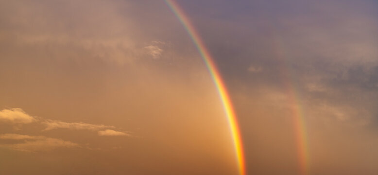 Full Rainbow Across the Sky Above Thessaloniki During a Dramatic Sunset