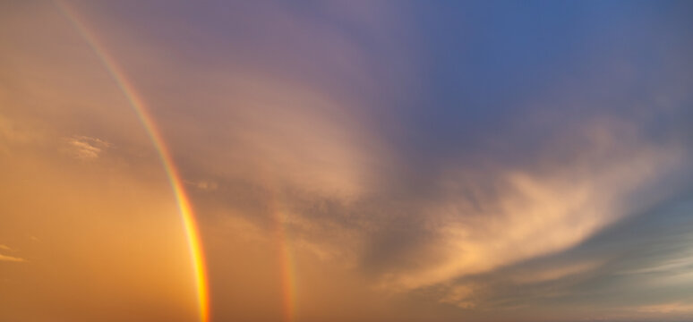 Full Rainbow Across the Sky Above Thessaloniki During a Dramatic Sunset