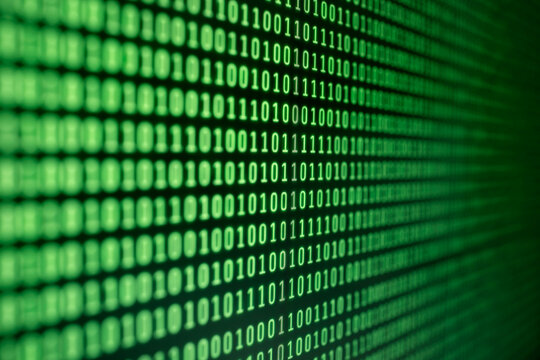 Binary code background on computer screen
