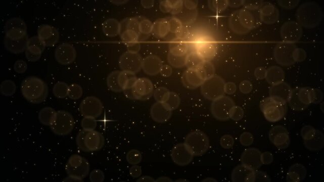 Golden bokeh and starbursts shimmer and glow on a dark background, creating a magical and festive atmosphere