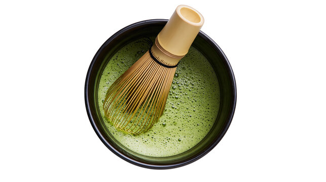 Isolated traditional Japanese matcha green tea bowl with bamboo whisk, healthy beverage