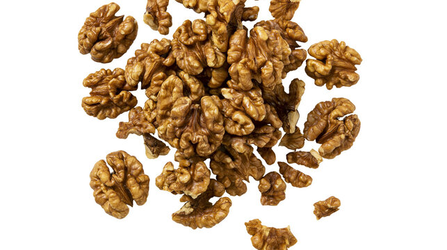 Isolated pile of fresh healthy shelled walnuts, natural snack for cooking and baking food
