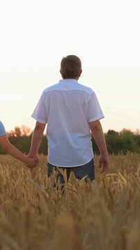 happy family, parents man woman holding children hands sunset park, mother father parents kid outdoors nature, harvest moon night, family camping under stars, parents teaching kids, mother daughter