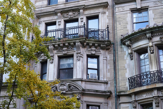 Old New York City apartment building with ornate decorative stonework