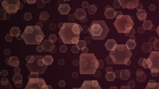 Abstract background of glowing hexagonal bokeh lights in warm amber tones on a dark maroon backdrop