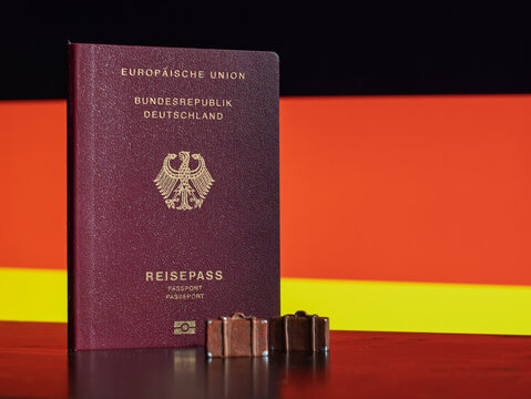 German Passport with Chocolate Treats on Table