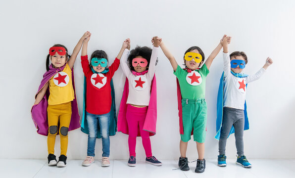Diverse asian black little boy girl children wearing colorful pretend superhero masks, capes, and costumes, posing together playful confidence imaginative energy back to school.