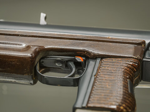 Detail of the trigger on a military pistol.