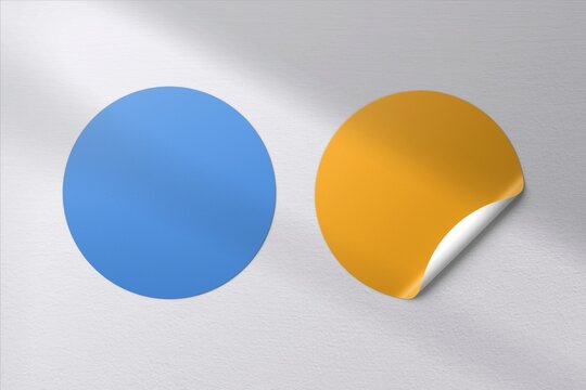 Blue and yellow sticker circles on textured background