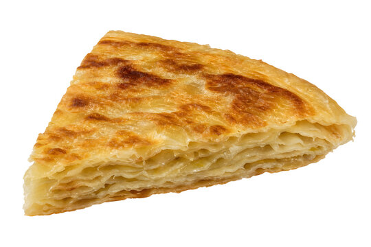Thick triangular slice of Turkmen katlama layered fried bread Isolated on White Background