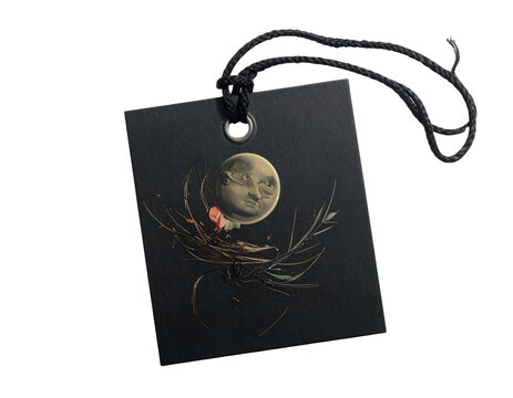 Isolated black square tag with celestial moon face illustration and string