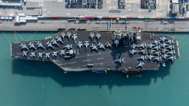 Aerial view nuclear powered aircraft carrier, USA navy ship carrier airplane fighter jet aircraft army navy nuclear ship carrier full fighter jet aircraft technology of battleship.