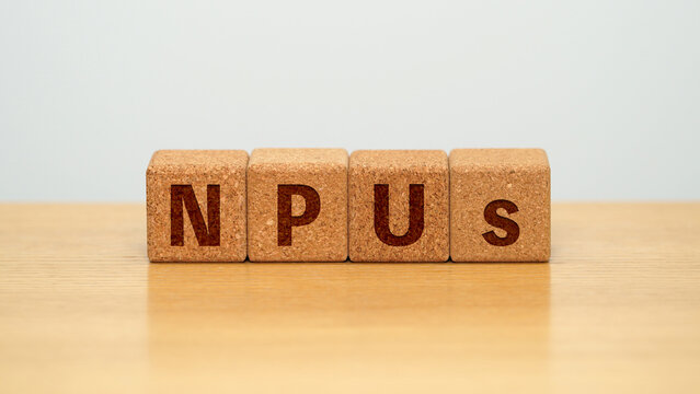 NPUs on four cork wooden blocks - neural processing units concept
