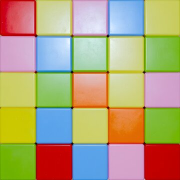 Colorful plastic cubes arranged in a grid pattern