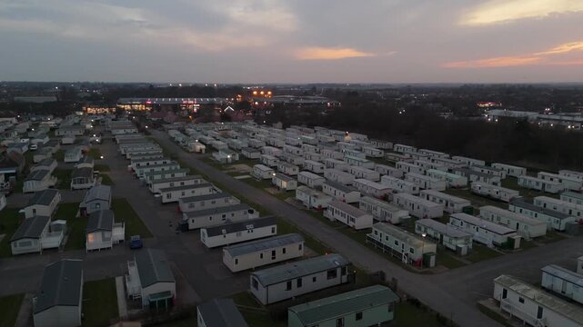 Aerial view of a large caravan park at dusk