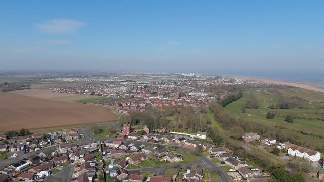 Aerial view of a coastal town on a clear day