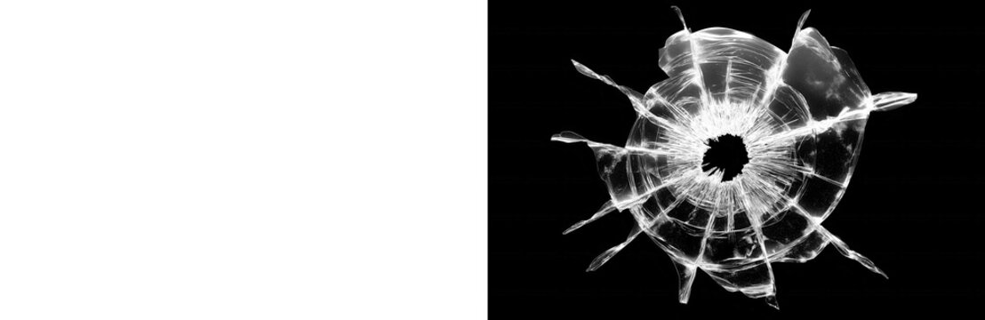 Realistic broken glass effect featuring sharp cracks and a shattered hole displaying dramatic white textures isolated on transparent background