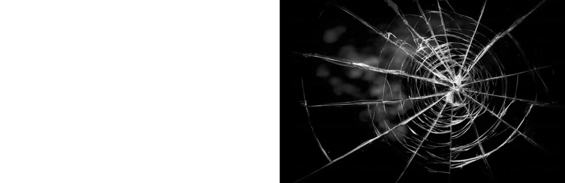 Shattered glass hole with dramatic radial cracks spreading outward across dark surface isolated on transparent background