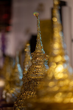 Golden Buddhist Stupa Amid Soft Bokeh Inspires Reflection on Mindfulness, Wisdom and Inner Peace