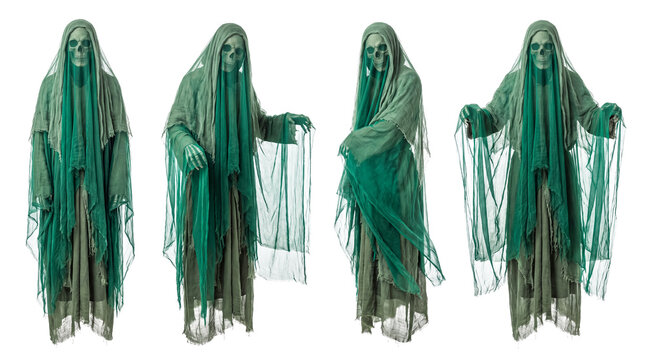 Four ghostly skull figures draped in green translucent fabric