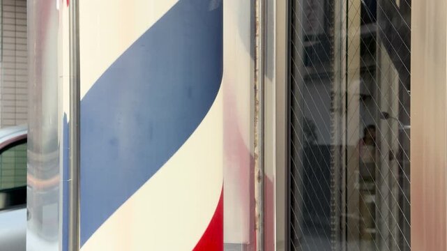 Rotating Barber Pole with Red White and Blue Stripes in Kanazawa
