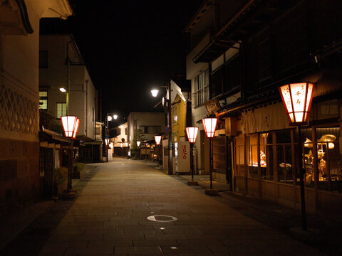 Traditional Street Illuminated by Paper Lanterns at Night in Kanazawa