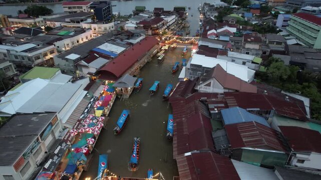 Aerial night view of Amphawa Floating Market scenery, Thailand
