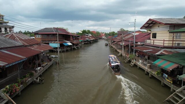 Aerial night view of Amphawa Floating Market scenery, Thailand