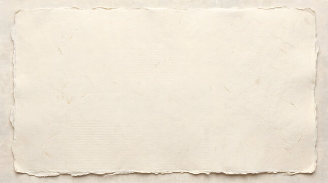Handmade deckle edge cotton paper sheet on textured linen surface for invitation mockup background