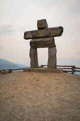 Inukshuk old historic rock monument on top of Whistler Mountain