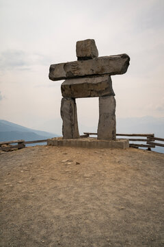 Inukshuk old historic rock monument on top of Whistler Mountain