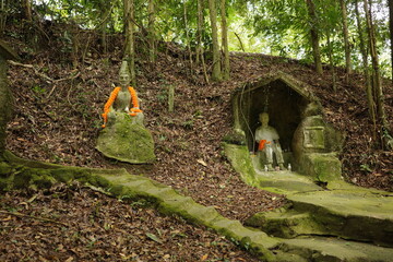 Naklejka premium Weathered statues at the Secret Buddha Garden on Koh Samui