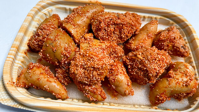 Savory deli pieces generously coated with spicy mentaiko