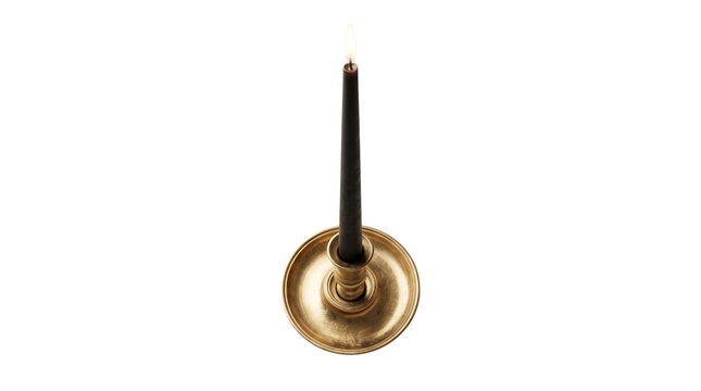 Vintage brass candlestick holder with lit black taper candle, elegant metallic candle stand isolated on white background, dark wax candle flame decor