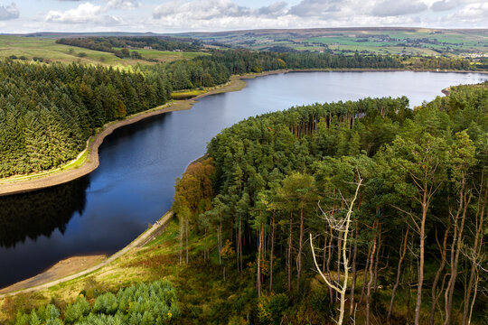 Aerial view of Entwistle forest reservoir with hills