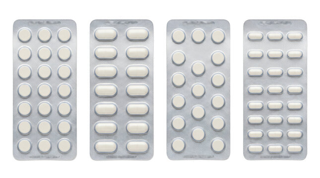 Four silver blister packs filled with white medicinal tablets arranged vertically on transparent background