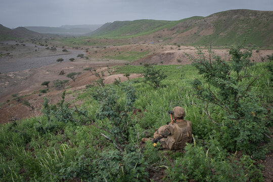 Desert valley opening out below French Army officer cadets during combat training in Djibouti