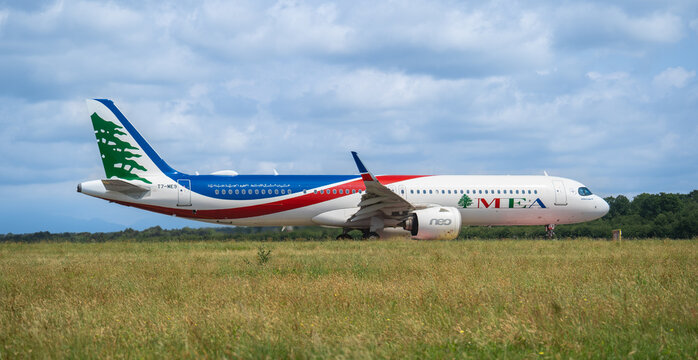 Middle East Airlines MEA Airbus A321neo passenger airplane taxiing on the runway at Malpensa Airport