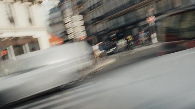 Blurry city traffic on a parisian street